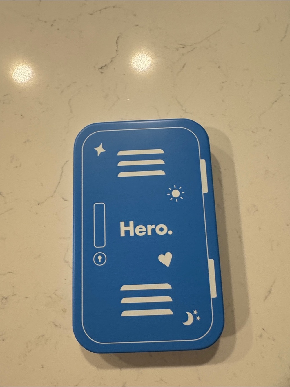 Limited Edition Blue 'Hero.' Tin Case with White Graphics